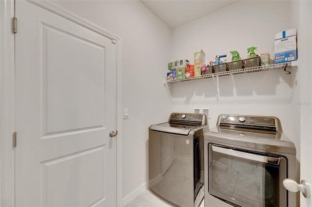 laundry area featuring washer and clothes dryer