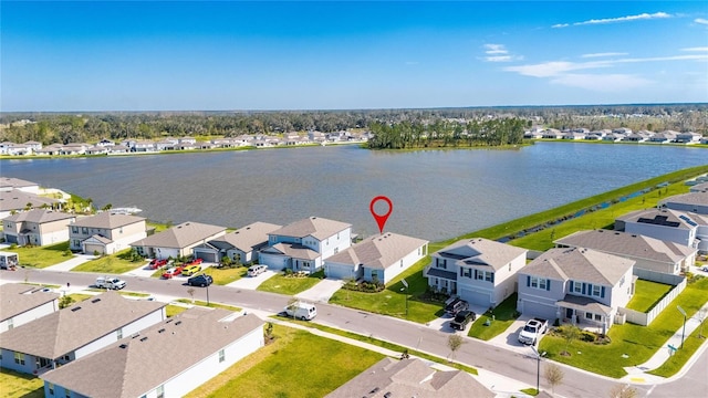 drone / aerial view featuring a water view