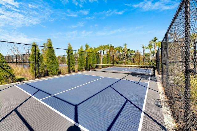 view of tennis court with basketball court