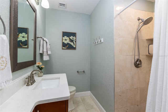 1806 17th St NW, Winter Haven, FL 33881 - full bathroom featuring toilet, tiled shower, vanity, and baseboards