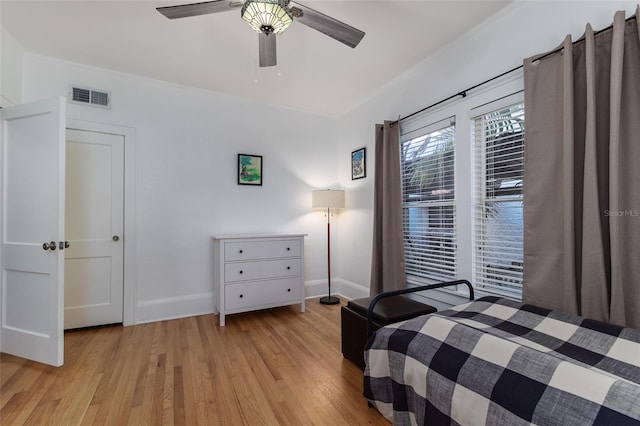1806 17th St NW, Winter Haven, FL 33881 - bedroom featuring light wood-style flooring, baseboards, and a ceiling fan