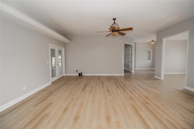 300 Winona Ct, Auburndale, FL 33823 - unfurnished living room featuring a ceiling fan, light wood-style floors, and baseboards