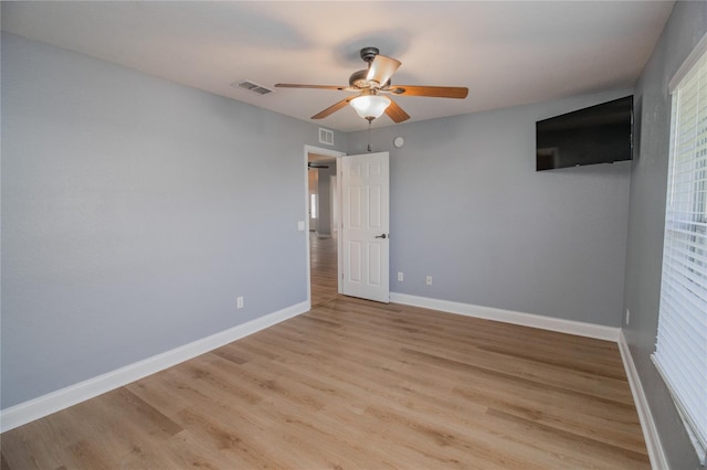 unfurnished bedroom with light hardwood / wood-style floors and ceiling fan