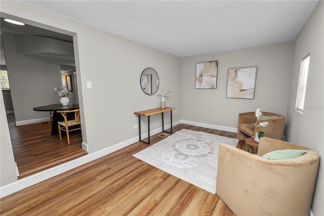 living area featuring hardwood / wood-style flooring