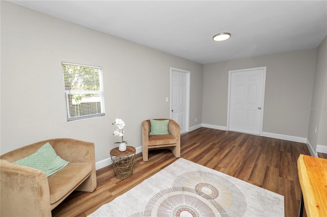 sitting room with hardwood / wood-style floors