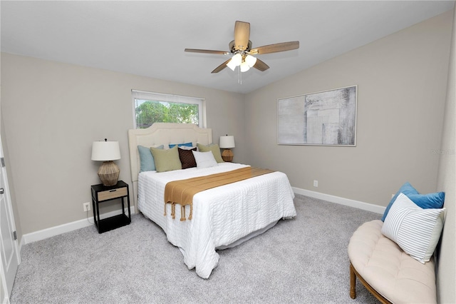 carpeted bedroom with lofted ceiling and ceiling fan