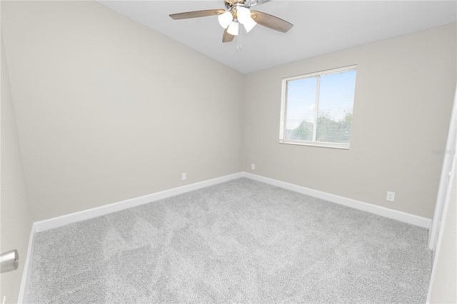 empty room with carpet floors and ceiling fan