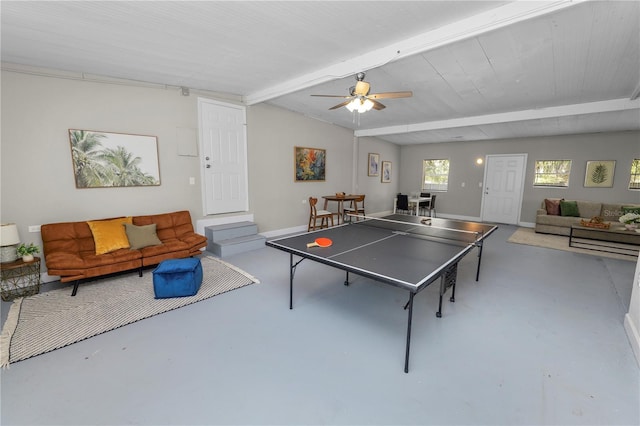 playroom featuring ceiling fan and lofted ceiling with beams