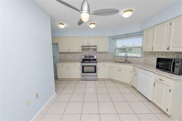 kitchen with backsplash, white dishwasher, sink, stainless steel range with electric cooktop, and ceiling fan