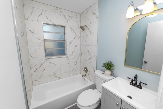 full bathroom featuring vanity, toilet, and tiled shower / bath combo