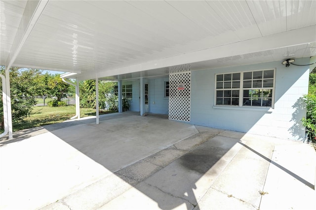 view of patio / terrace featuring a carport