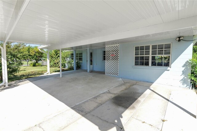 1220 Woodland Ave, Lakeland, FL 33801 - view of patio featuring a carport