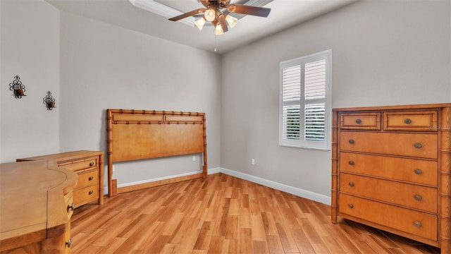 bedroom featuring ceiling fan and light hardwood / wood-style flooring