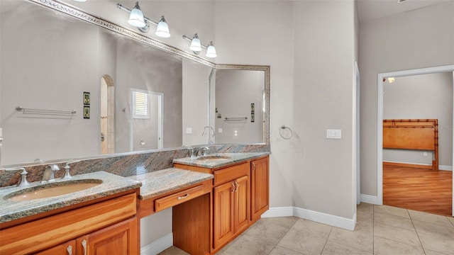 bathroom featuring hardwood / wood-style flooring and vanity