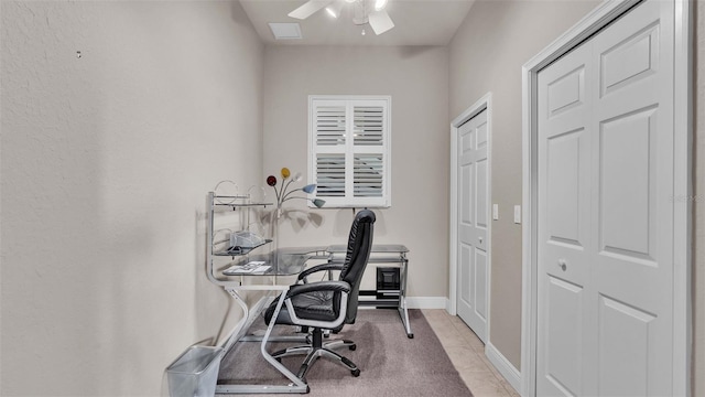 tiled office with ceiling fan