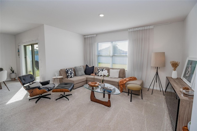 living room with light colored carpet