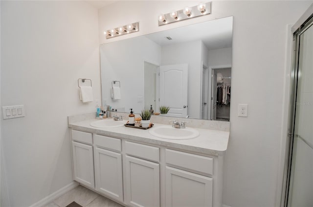 bathroom featuring vanity and tile patterned floors