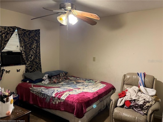 bedroom featuring ceiling fan and cooling unit