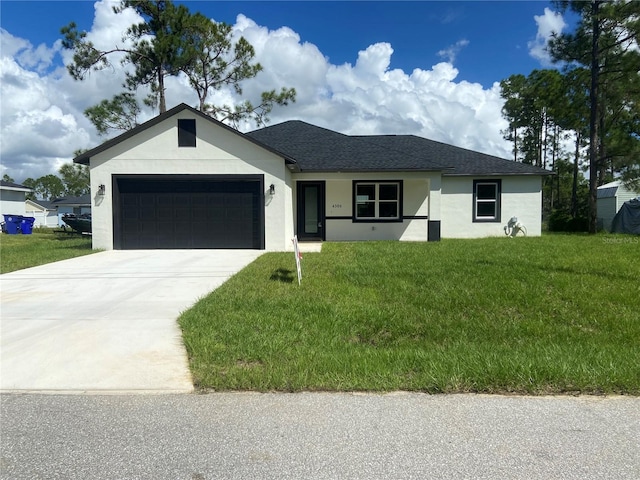 ranch-style house with a front yard and a garage