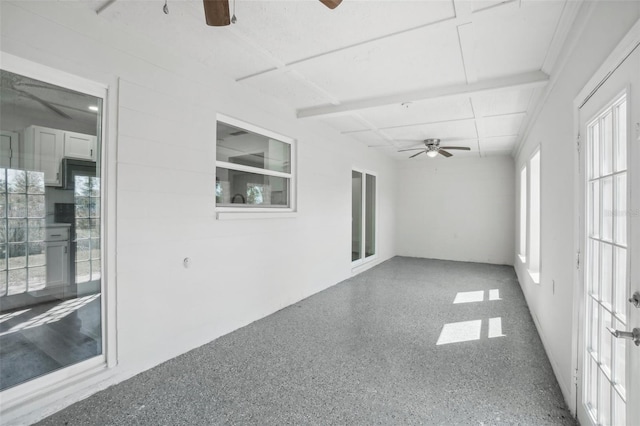 interior space featuring ceiling fan