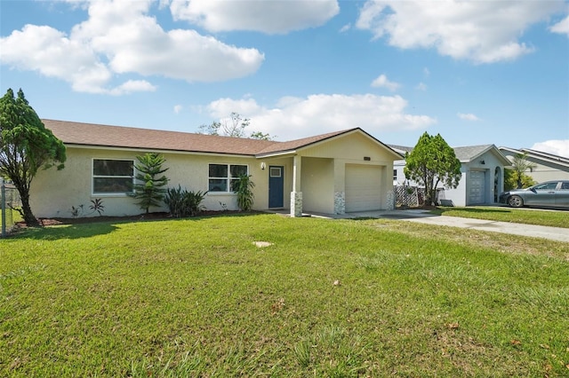 single story home with a front yard and a garage