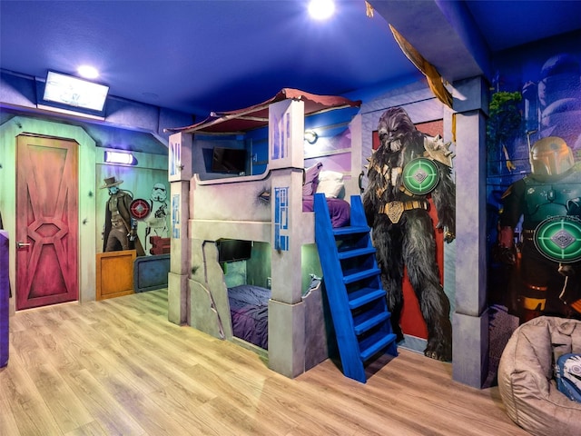 playroom with hardwood / wood-style floors