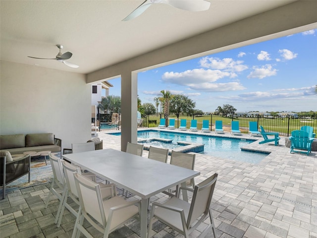 view of pool featuring a patio area, an outdoor living space, and ceiling fan