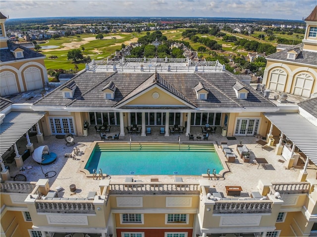 view of swimming pool featuring a patio