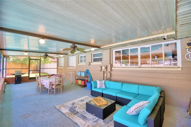 exterior space featuring wooden ceiling and ceiling fan