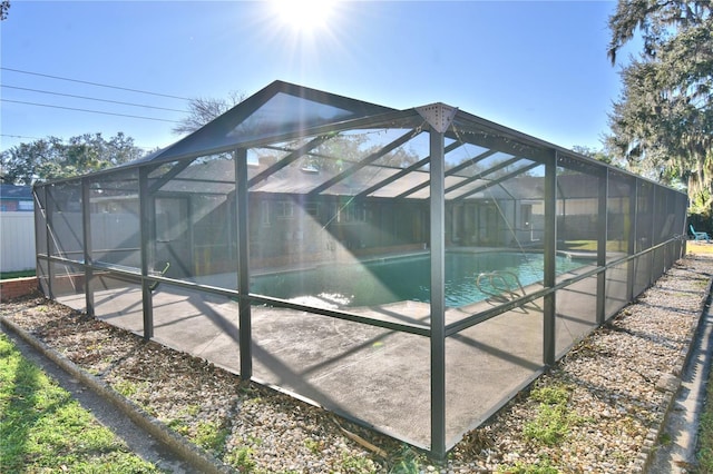 view of pool featuring a lanai