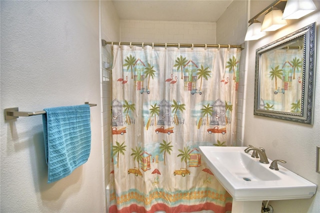 bathroom with sink and shower / bath combo