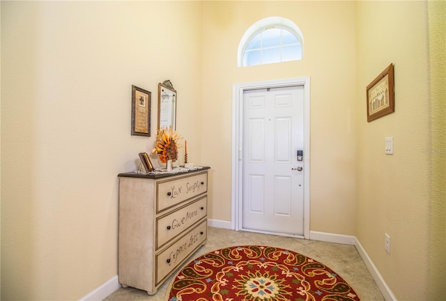 foyer with light tile patterned floors