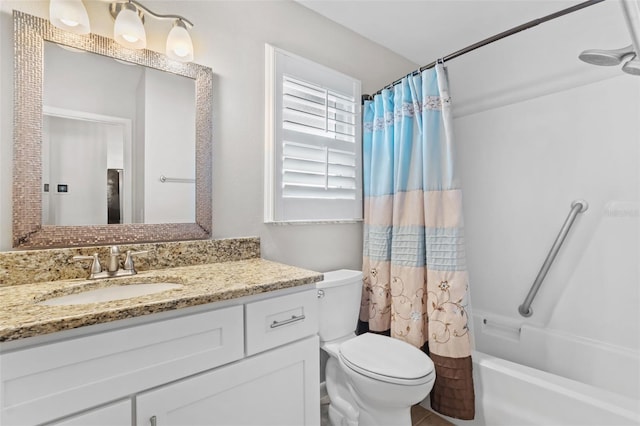 bathroom with toilet, shower / tub combo, and vanity