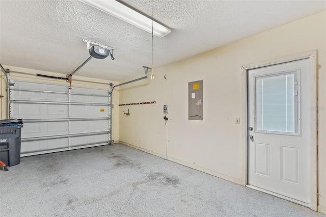 garage featuring electric panel and a garage door opener