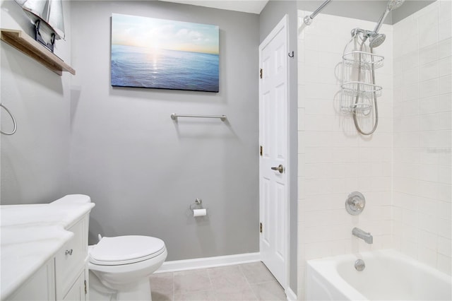 full bathroom with vanity, toilet, tile patterned floors, and tiled shower / bath combo