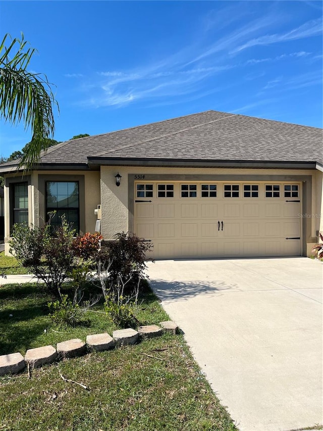 view of front of home featuring a garage