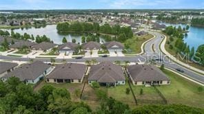 aerial view featuring a water view and a residential view