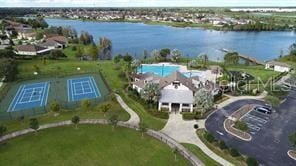 bird's eye view with a water view