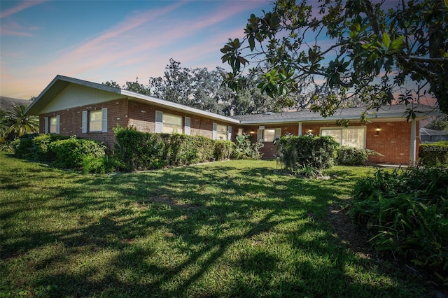 exterior space with a lawn