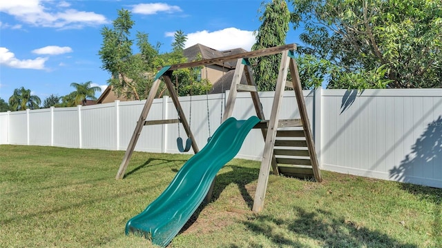 view of playground featuring a lawn