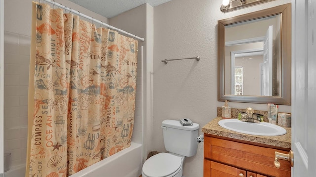 full bathroom featuring vanity, shower / tub combo, a textured ceiling, and toilet