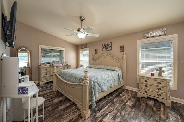 bedroom featuring lofted ceiling, dark hardwood / wood-style floors, and ceiling fan