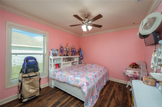 bedroom with ornamental molding, dark wood-type flooring, and ceiling fan