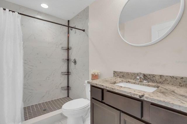 bathroom with vanity, toilet, and a shower with curtain