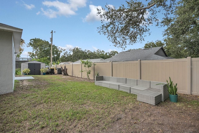 view of yard featuring a storage unit