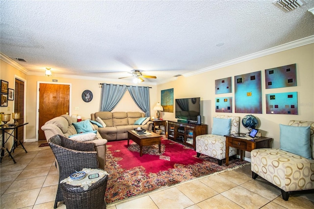 tiled living room featuring a textured ceiling, ceiling fan, and ornamental molding