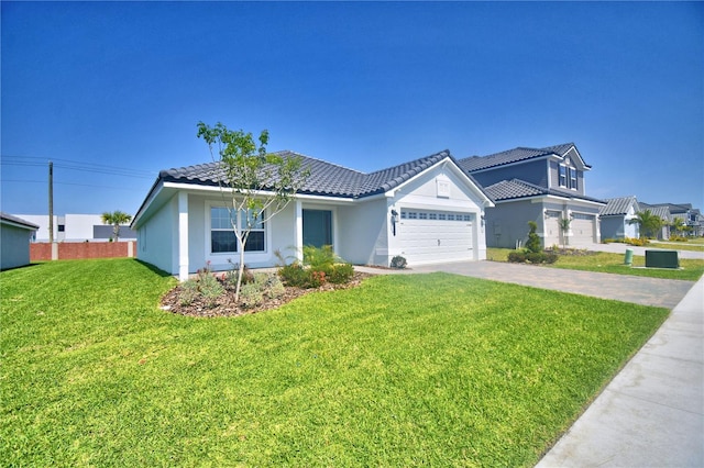 view of front of home featuring driveway, stucco siding, a front lawn, a tiled roof, and a garage