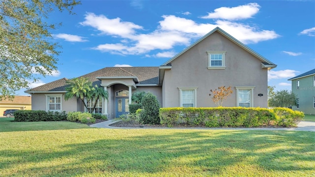 view of front of home featuring a front lawn