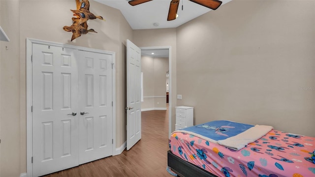 bedroom featuring a closet, ceiling fan, and hardwood / wood-style floors