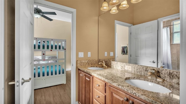 bathroom with vanity and ceiling fan